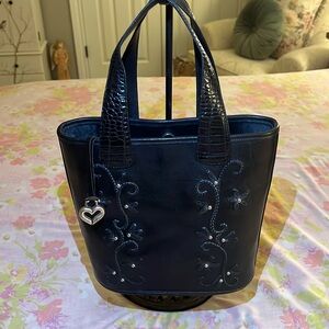 Black leather vintage Brighton bucket bag.